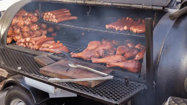 smoker grill with turkey and smoked sausage